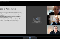 Dyskusja nad wystapieniem w ramach panelu Ochrona polityki bezpieczeństwa w cyberprzestrzeni w XXI wieku. Zrzut ekranu ze slajdem prezentacji i miniaturami uczestników.